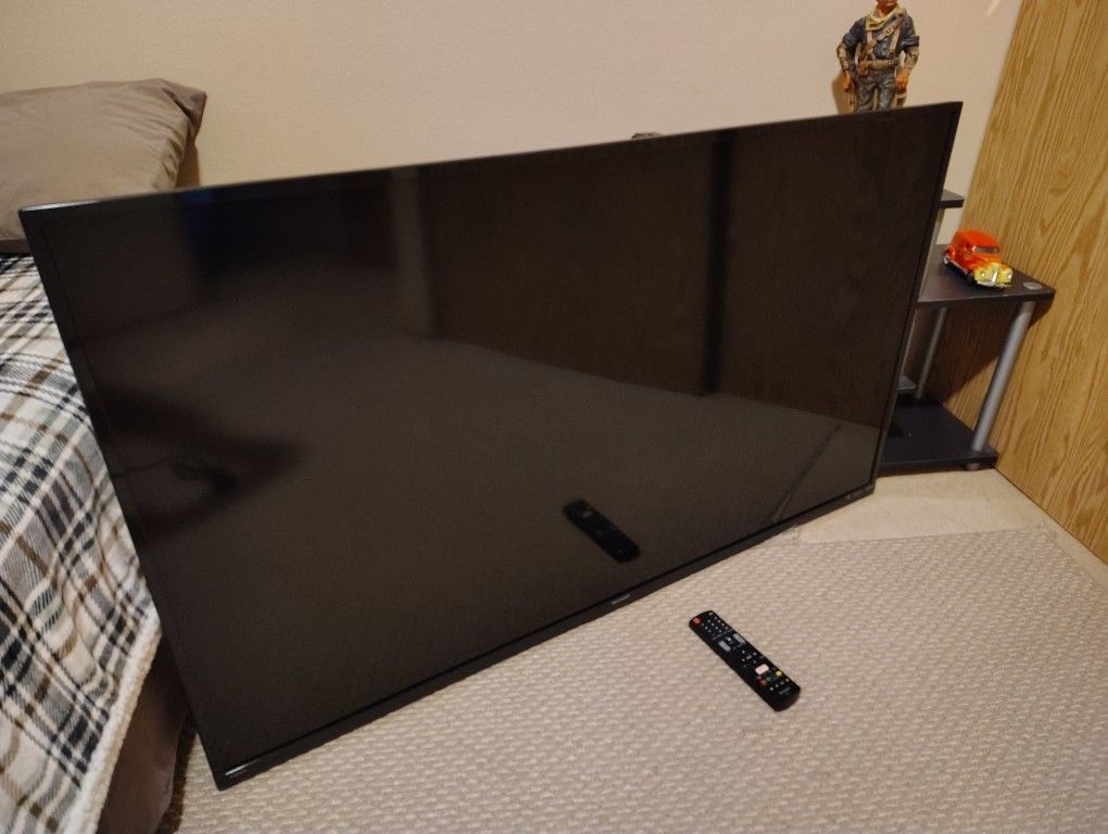 Great TV With little Use as it was in spare room, 55 Inch screen, original remote,zero Issues!