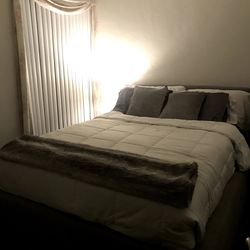 Upholstered Queen bed frame with drawers