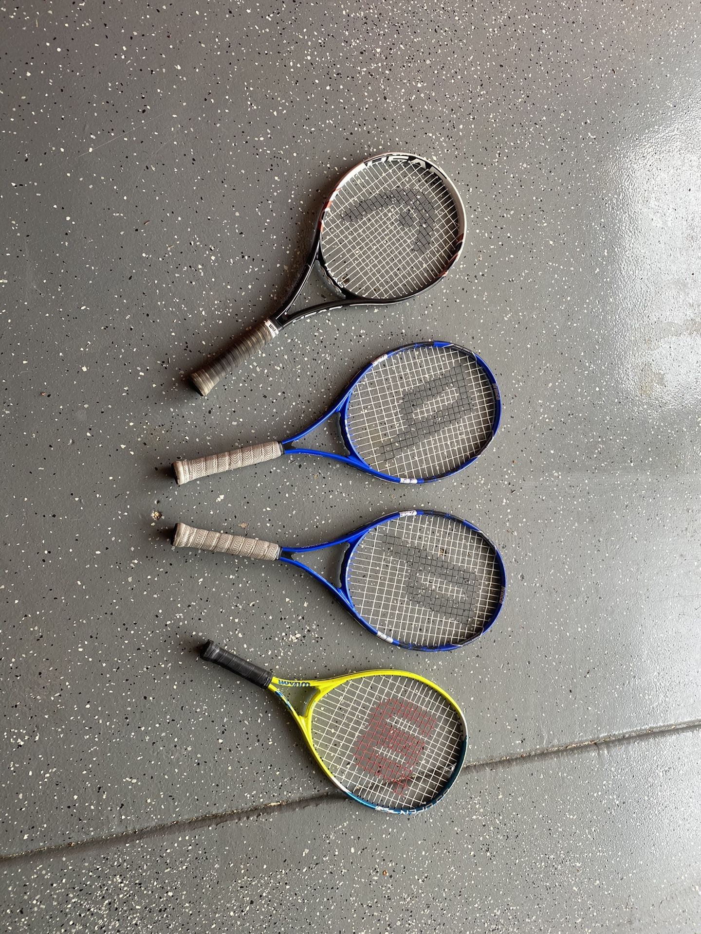 4 tennis rackets