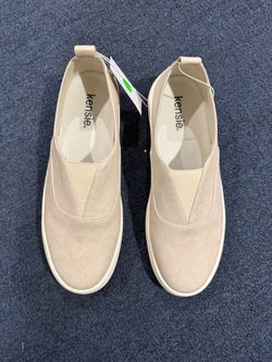Woman’s beige/tan slip on shoes in a size 9