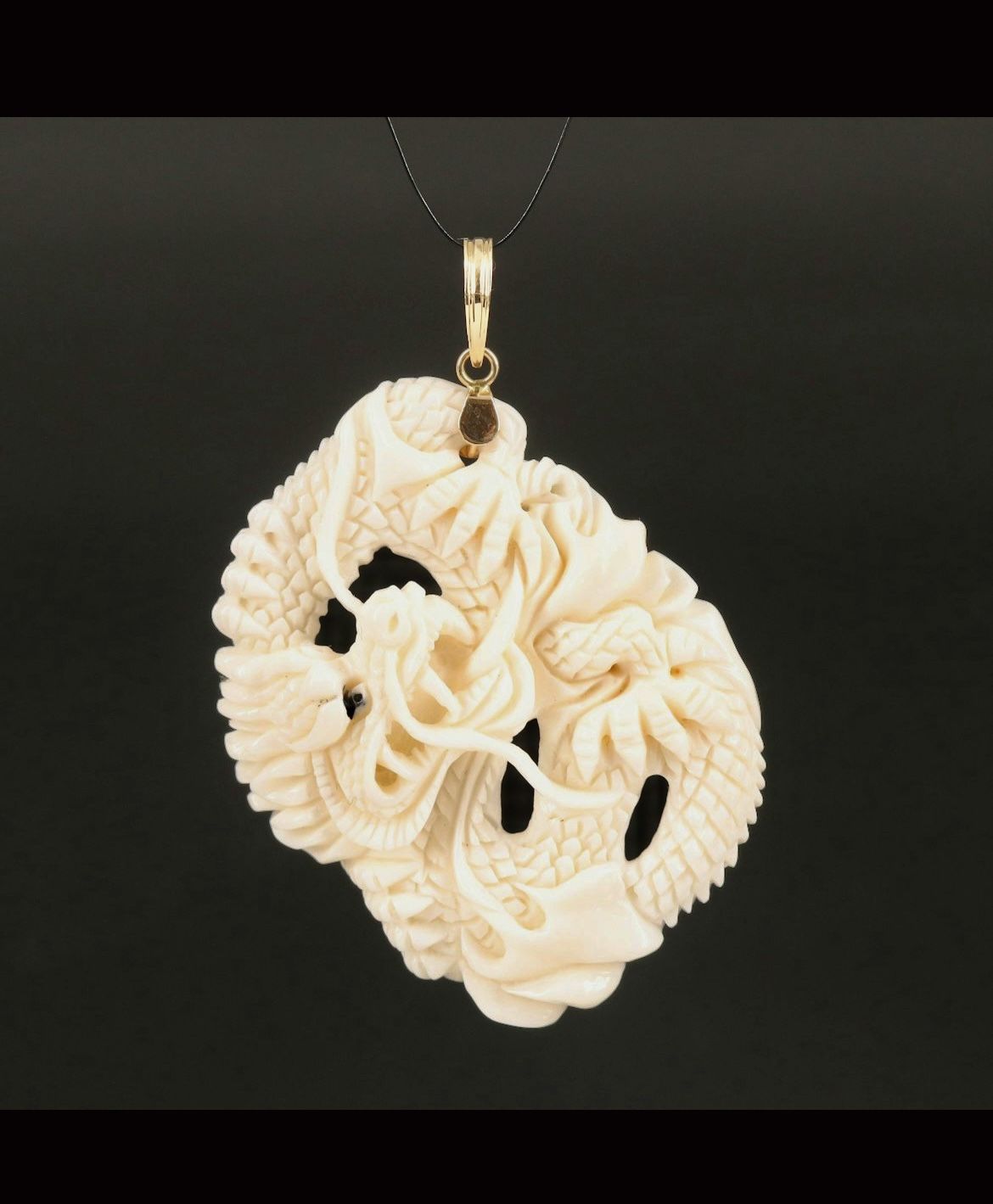 Carved Dragon Bone Pendant With Gold Bail