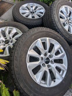 RIMS  AND TIRES 20" SUBURBAN TAHOE