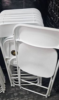 White plastic folding chairs