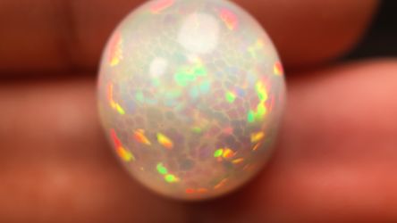 Natural Ethiopian Welo Opal 8.61 Ct Certified Oval Cabochon Play of Color