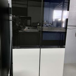 Samsung Bespoke Bespoke 29 Cu. Ft. 4-Door Flex French Door Refrigerator with AI Family Hub+ in Black And White Glass.