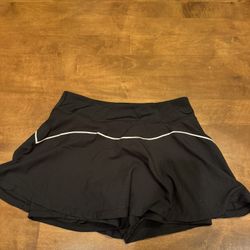 Woman’s new without tags East West Company tennis skirt shipping available