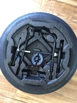 BRAND NEW SPARE TIRE w/ COMPLETE SET