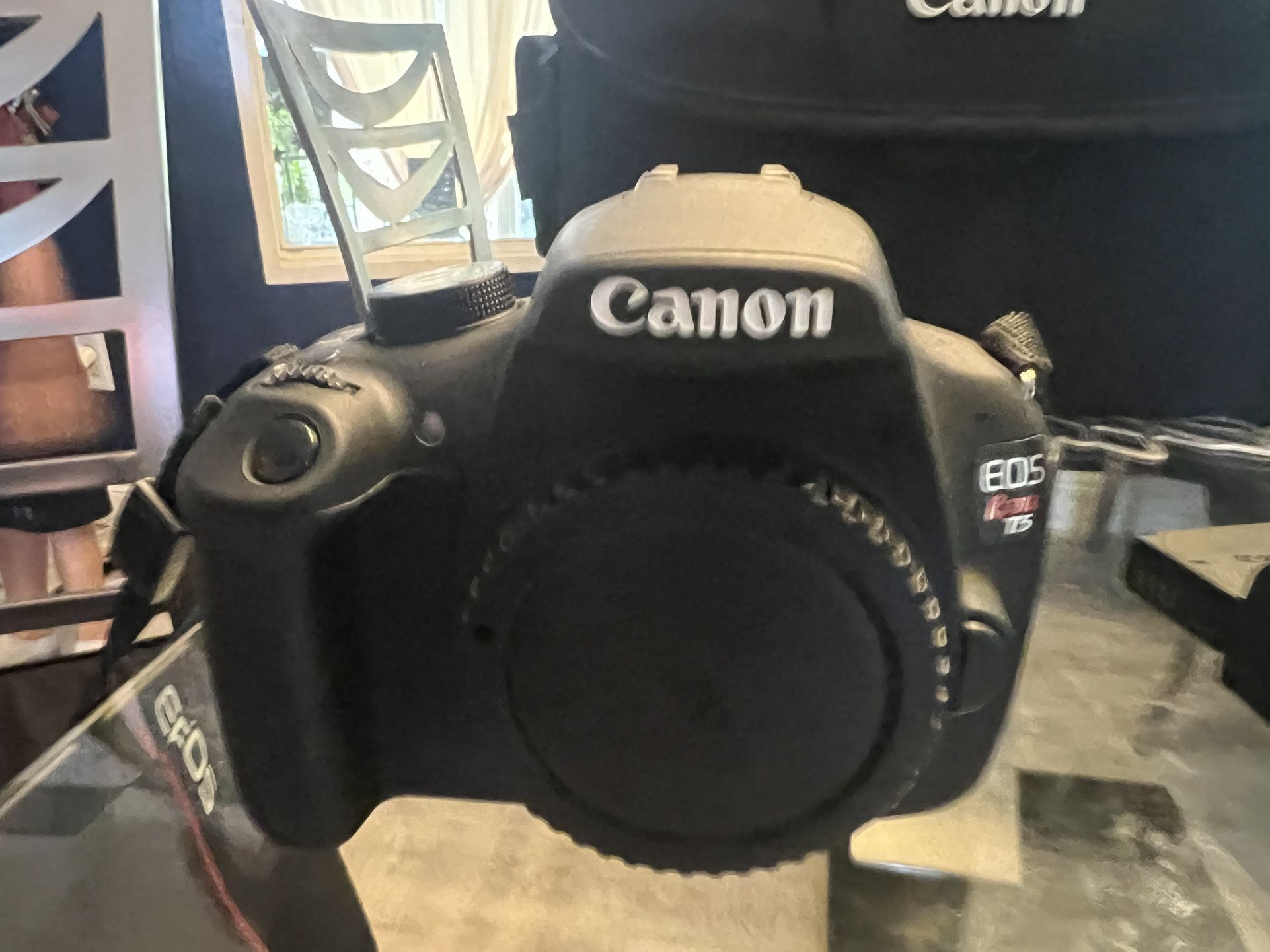 Canon EOS rebel T5, digital single lens reflex camera, including two additional lenses, charger, and carrying case