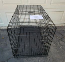 Dog Ramp and large dog crate two doors and a divider