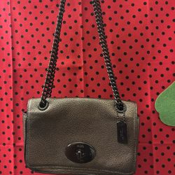 Grey vintage shoulder coach purse