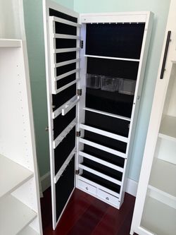 Wall mounted jewelry armoire