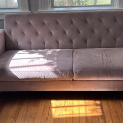 Pink Couch Opens As Futon 