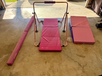 Kids gymnastics bar, mats and balance beam