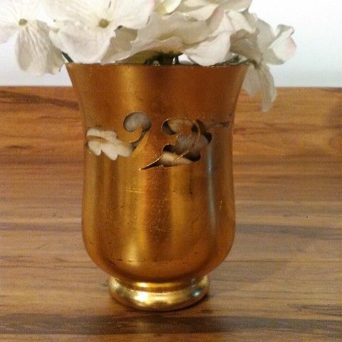 Lovely Floral Arrangement: Silver & White Flowers, Gold foiled Glass Vase. Overall Size: 18” x 10”. Vase: 6 H x 4.25” (top), 4.25” (bottom), 3” (base)