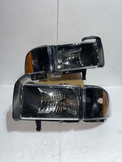 REFURBISHED 94-01 DODGE RAM BLACK HOUSING AMBER CORNER HEADLIGHTS