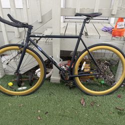 Pure Fix Cycles bicycle, Gold color.  