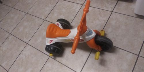 White and orange toddler bike