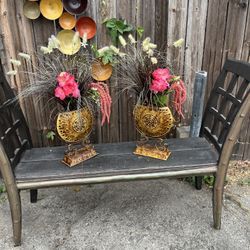 Pair of Decorative Aztec-Style Metal Vases with Faux Floral Arrangements  Description: Add a bold touch to your space with this matching pair o