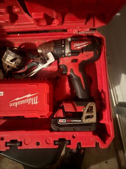 milwaukee drill and 3 batteries with charger
