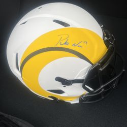 Puka Nacua autographed Rams helmet