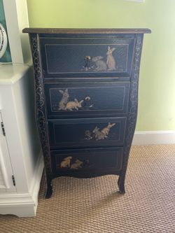 wooden chest with bunny motif