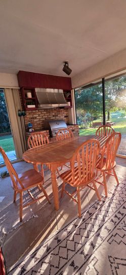 Wooden table with 6 chairs