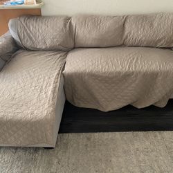 Light Gray Sectional Sofa with Storage + Pull-Out Bed
