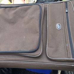 Large Brown Rolling luggage
