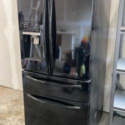 Free Samsung fridge, French doors, bottom freezer and third drawer.