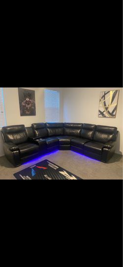 Black leather sectional with electric recline