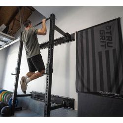 Tru Grit Foldable Wall-Mount Power Rack / Squat Rack – $250