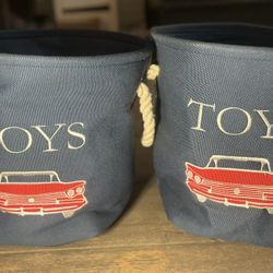 Gently used set of 2 blue toys storage basket with red classic car rope handles