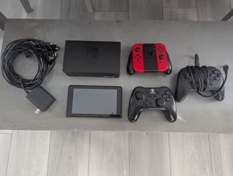 Nintendo Switch V2 Bundle – Includes Dock, Red Joy-Cons, & 2 Pro Controllers