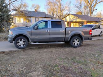 Gray 2004  F-150  6 ' bed 4x4 Truck