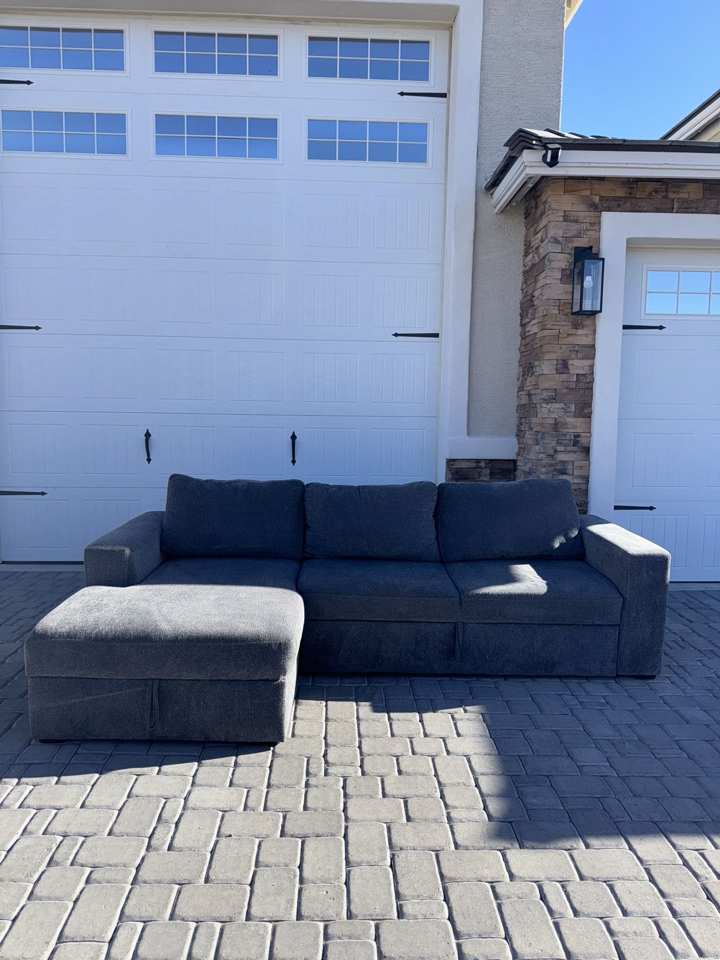 Living Spaces Sebastian Slate Gray Convertible Couch