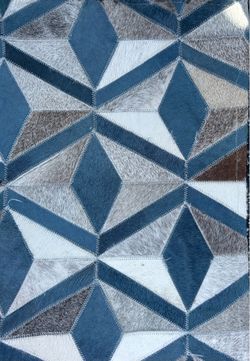 patchwork cowhide rug with a 3D geometric diamond design blue, gray & cream 17 feet x 15 feet