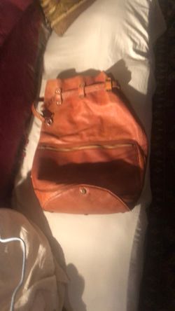 Lg Vintage Leather Duffle, 23” High by 28” Wide 