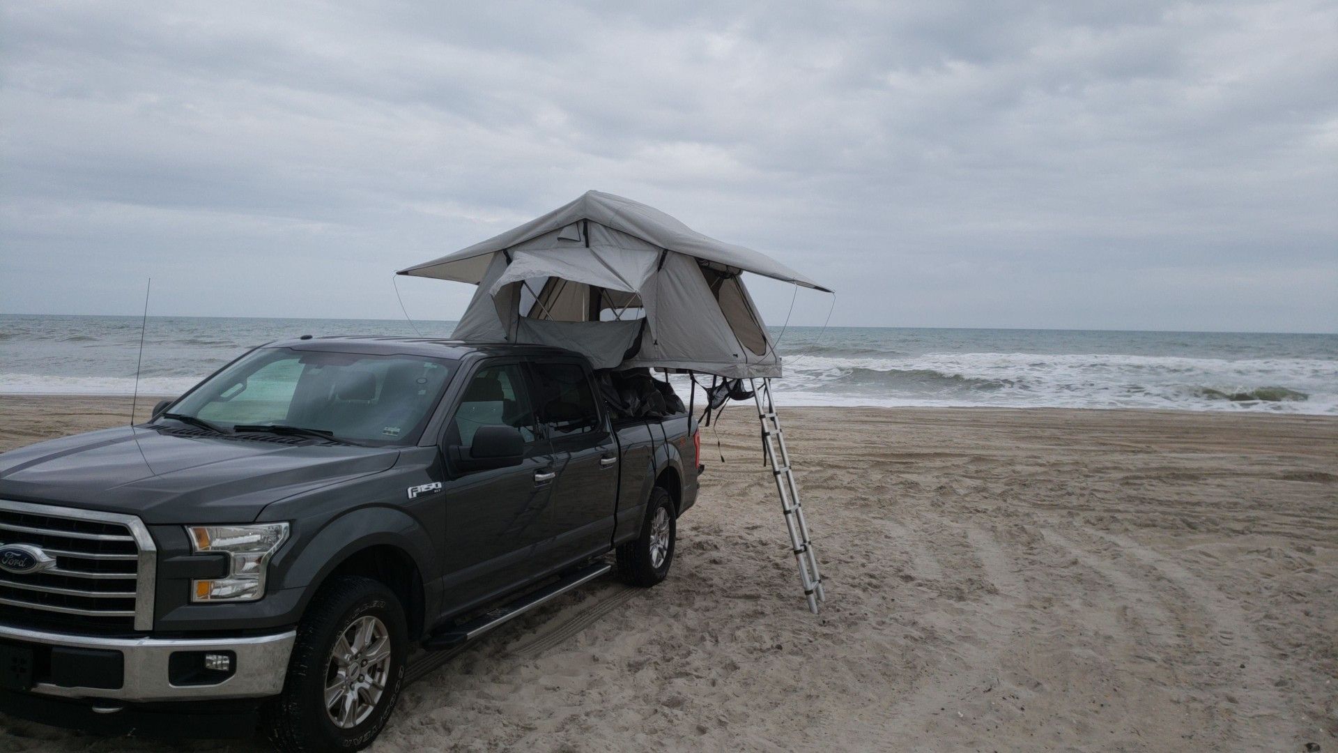 Roof top tent and rack for pickup truck