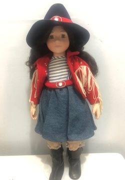 Porcelain cowgirl doll