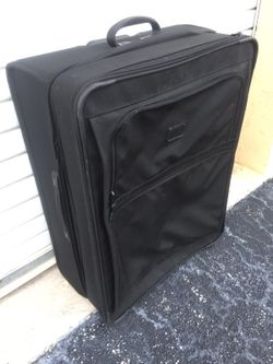 Large TUMI suitcase