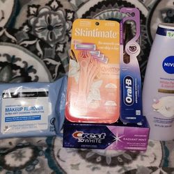 Womens hygiene bundle: Nivea Bodywash, Skintimate Razor, Crest, Oral B And Nivea Makeup Wipes
