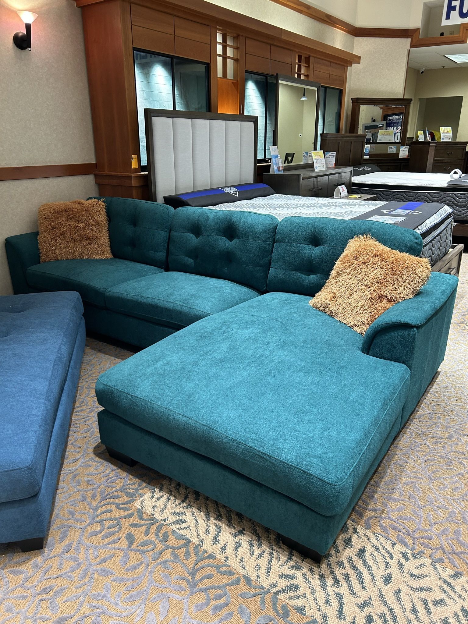 Biscayne Green Sectional And Ottoman Set Only $899