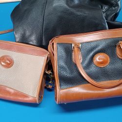Classic Hand Bags by Dooney And Bourke. 