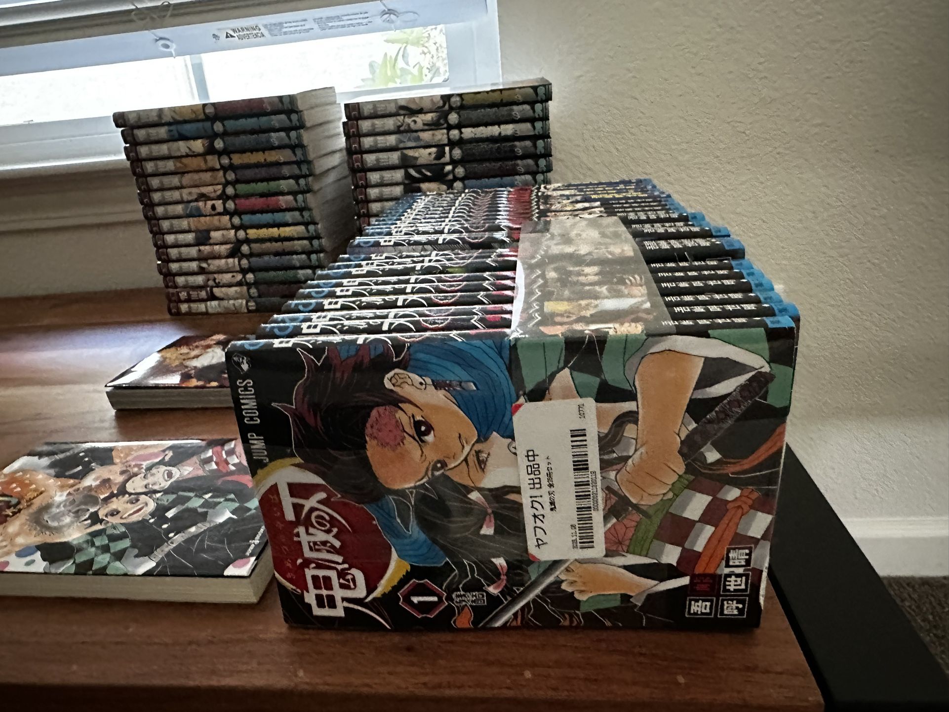 Full Metal Alchemist and Demon Slayer Manga