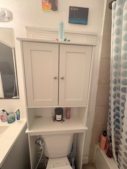 Over toilet storage shelves