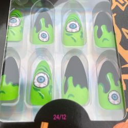 Green Slime and Eyeballs Black And Green Medium Stiletto Press on Nails