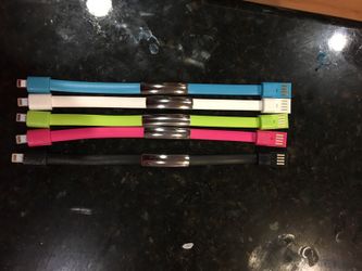 iPhone cord bracelets: green, blue, pink, black, and white