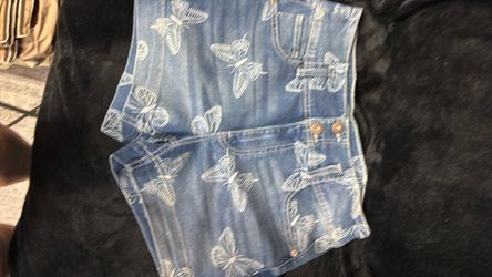 Denim shorts with white butterflies