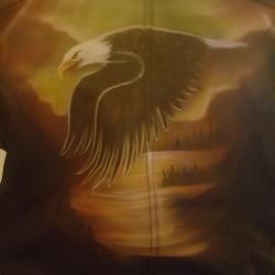 Very nice and like new one of a kind airbrush city streets genuine leather coat it is xl size the art work was $240.00 alone