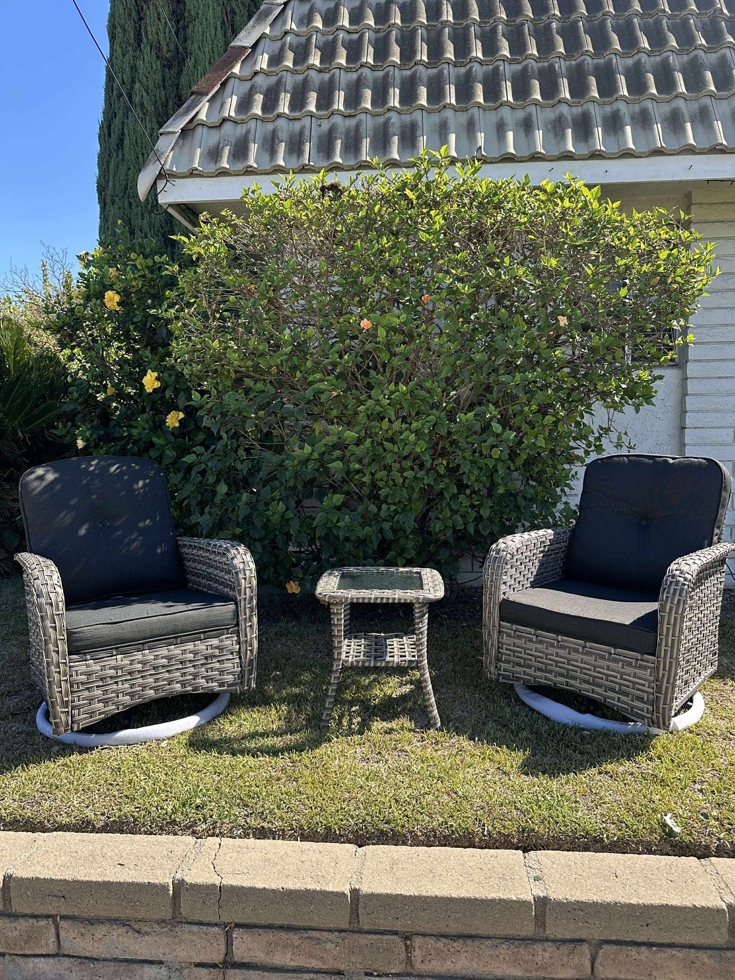 3-Piece Gray Wicker Outdoor Rocking Chairs with Coffee Table and Black Cushions